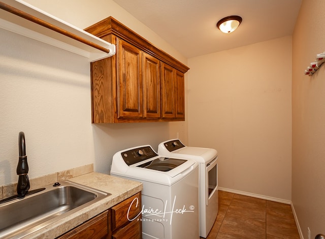 5305 Wimberley Spring Ct, Midland, TX 79707 - laundry area with cabinet space, independent washer and dryer, and tile patterned flooring