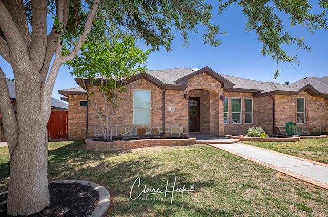 5305 Wimberley Spring Ct, Midland, TX 79707 - ranch-style home with brick siding and a shingled roof