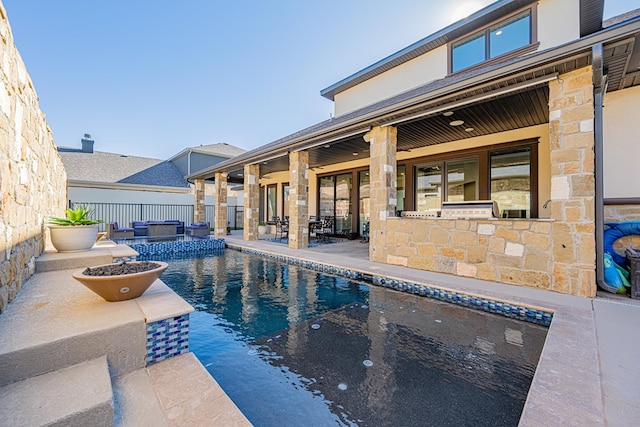 view of swimming pool featuring a patio area