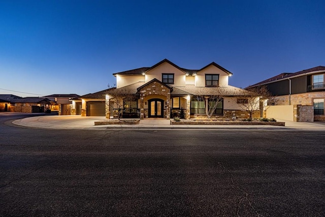 view of front of property featuring a garage