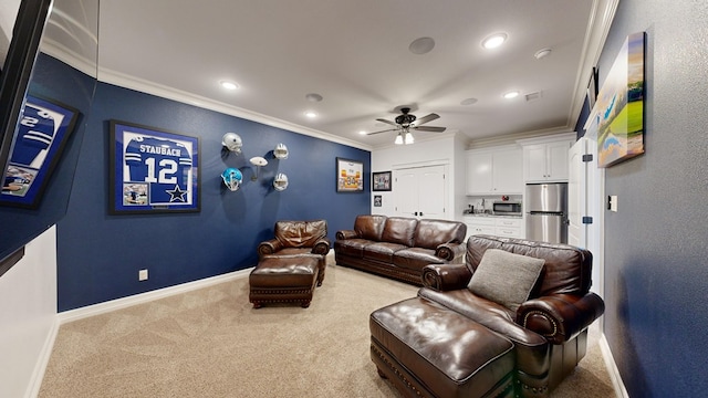 carpeted living room featuring ornamental molding and ceiling fan