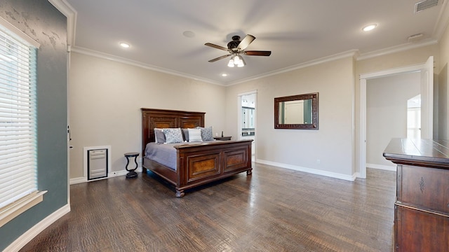 bedroom with crown molding, ceiling fan, and dark hardwood / wood-style floors