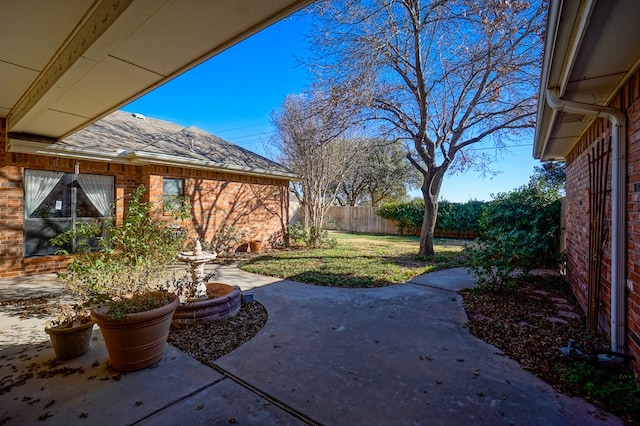 view of patio / terrace with fence