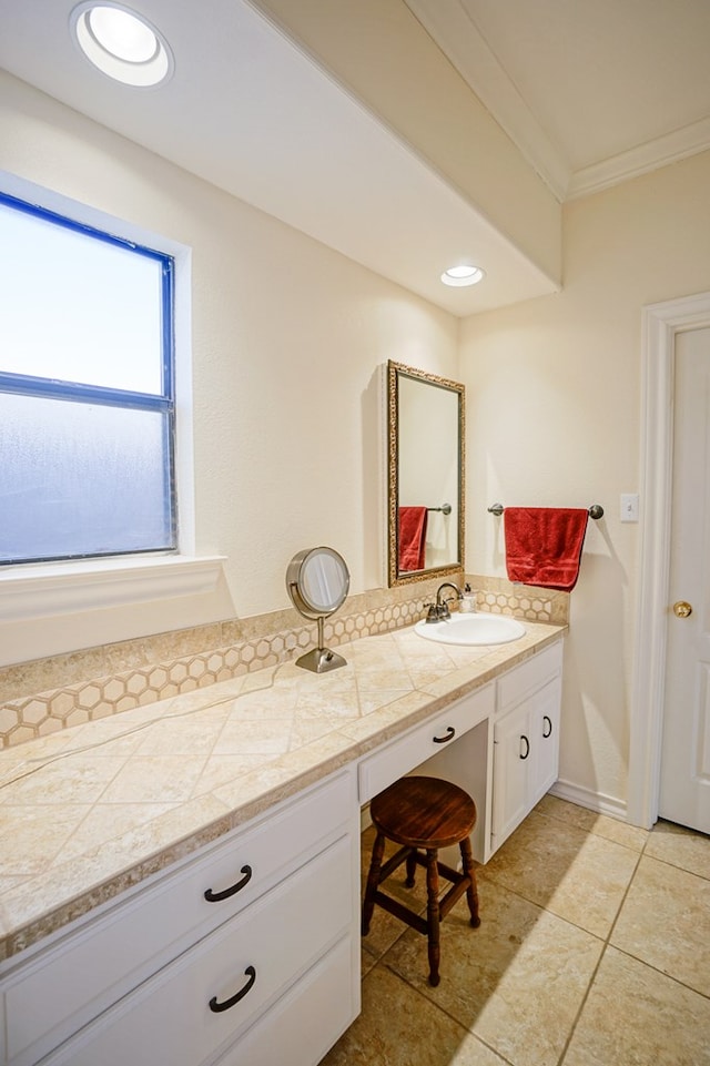 bathroom with recessed lighting, tile patterned flooring, ornamental molding, and vanity