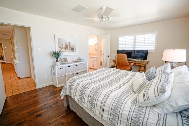 bedroom featuring ensuite bathroom, ceiling fan, and dark hardwood / wood-style floors