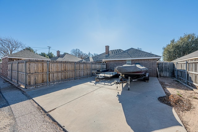 exterior space featuring a fenced backyard