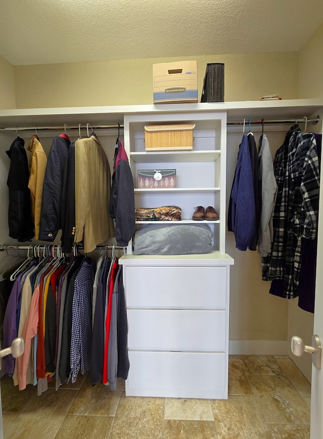 6101 Fm 715, Midland, TX 79706 - walk in closet with stone finish flooring