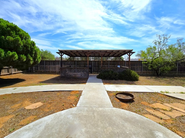6101 Fm 715, Midland, TX 79706 - fenced backyard with a pergola