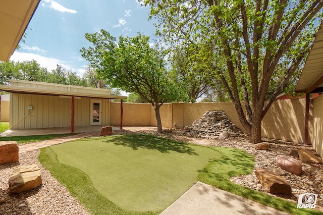 view of yard featuring a fenced backyard and a patio area