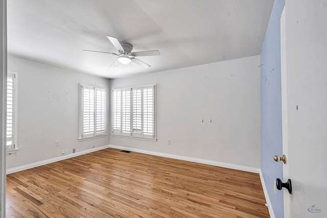 2008 Bedford Dr, Midland, TX 79701 - empty room featuring light wood-style flooring, a ceiling fan, and baseboards
