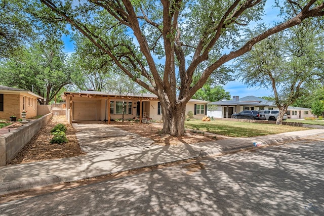 2008 Bedford Dr, Midland, TX 79701 - ranch-style house with a garage, concrete driveway, and stucco siding