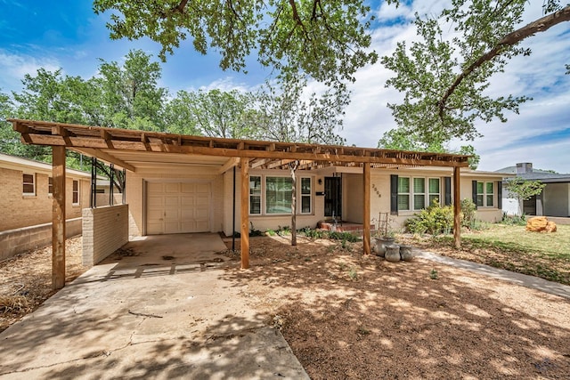 2008 Bedford Dr, Midland, TX 79701 - ranch-style house with an attached garage, driveway, and brick siding
