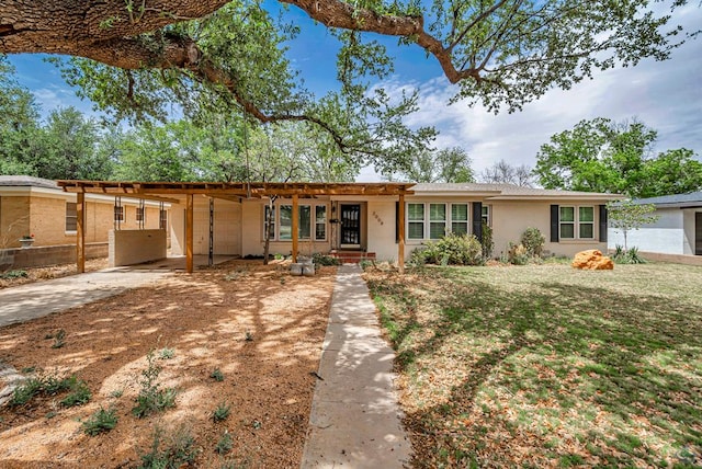 2008 Bedford Dr, Midland, TX 79701 - single story home with concrete driveway, a carport, and stucco siding