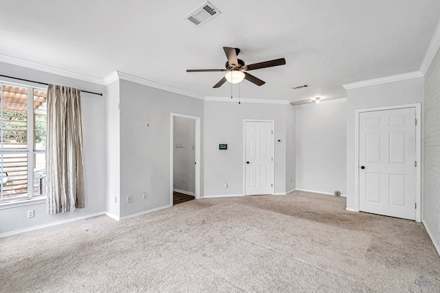 2008 Bedford Dr, Midland, TX 79701 - carpeted spare room featuring a ceiling fan, crown molding, and baseboards
