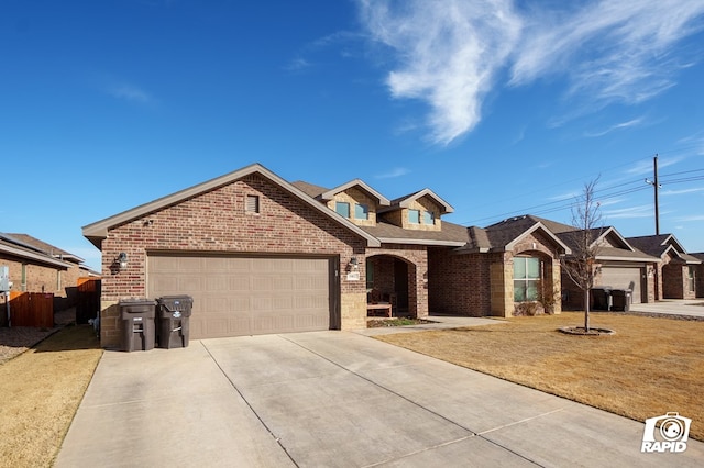 view of front facade featuring brick siding, roof with shingles, concrete driveway, an attached garage, and a front lawn