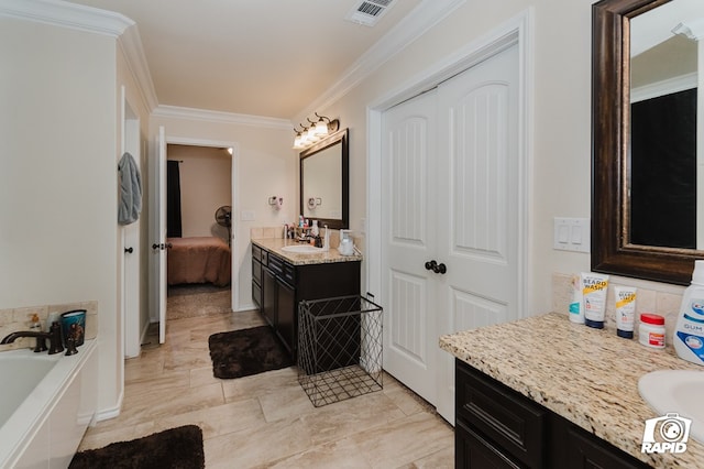 ensuite bathroom with visible vents, ensuite bath, a garden tub, crown molding, and vanity