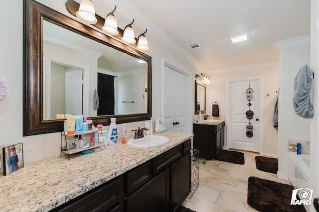 full bath with two vanities, visible vents, decorative backsplash, ornamental molding, and a sink