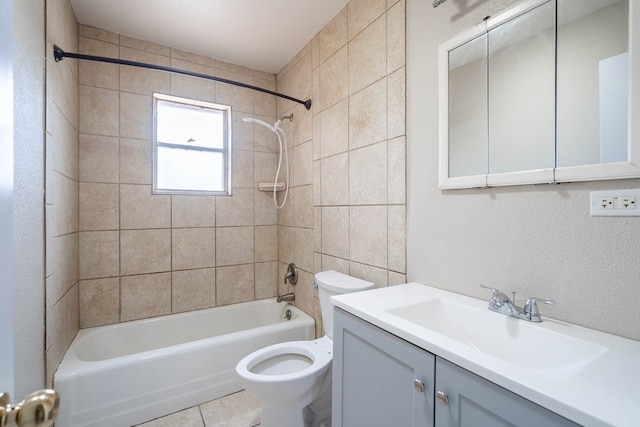 bathroom with bathtub / shower combination, toilet, and vanity