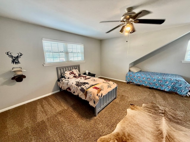 3302 Cord Dr, Midland, TX 79705 - carpeted bedroom with multiple windows and a ceiling fan