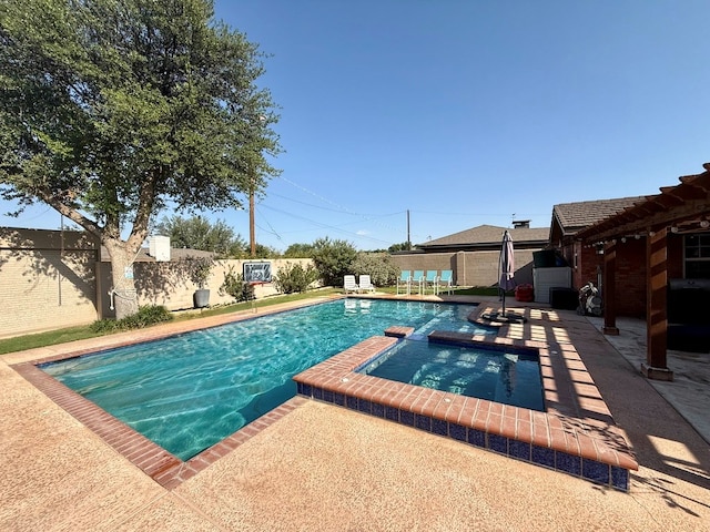 3302 Cord Dr, Midland, TX 79705 - view of swimming pool featuring a pool with connected hot tub and a patio area