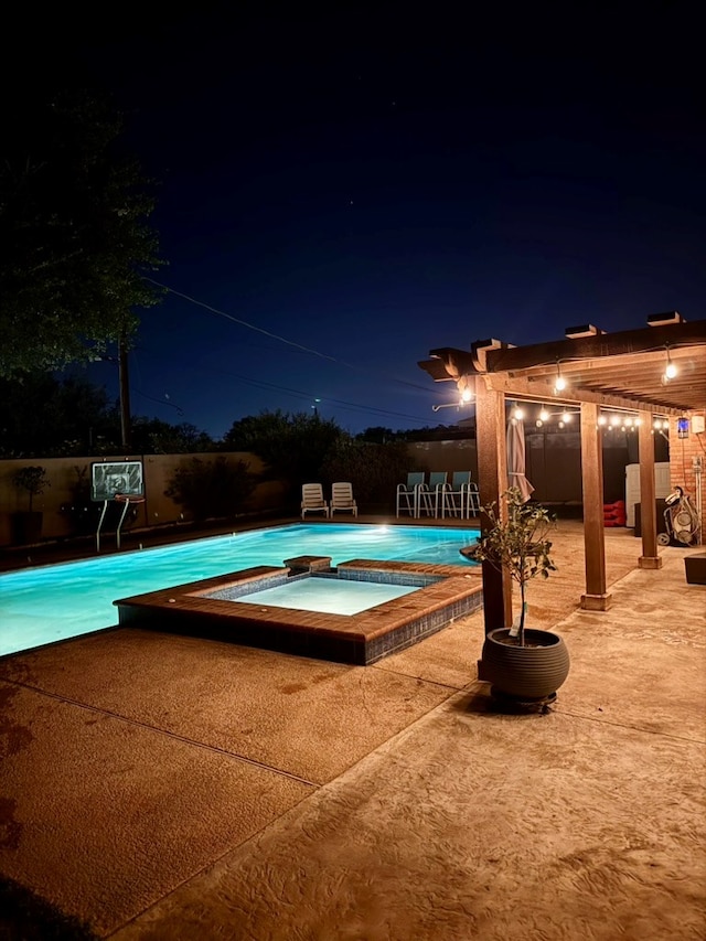 3302 Cord Dr, Midland, TX 79705 - pool at twilight featuring a patio area and a pool with connected hot tub