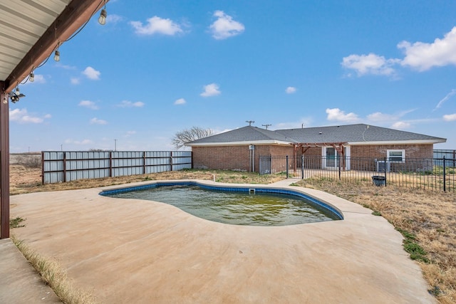 view of pool with a patio area, a fenced in pool, and a fenced backyard