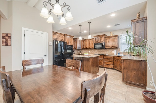 tiled dining room featuring sink, vaulted ceiling with beams, and a chandelier