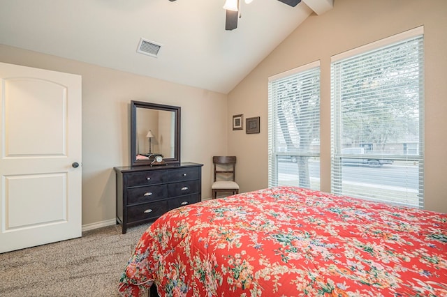 carpeted bedroom with vaulted ceiling and ceiling fan