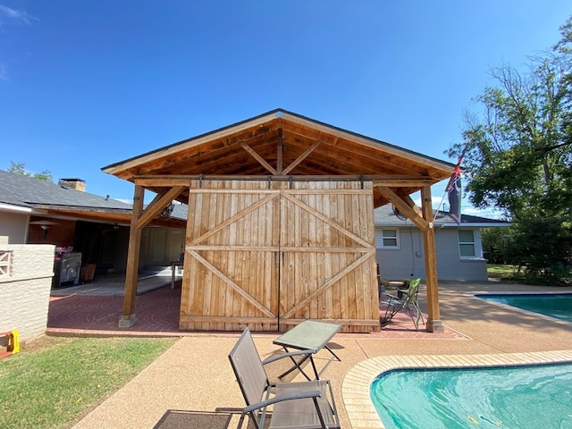 3501 Austin Pl, Snyder, TX 79549 - exterior space with a patio and an outbuilding