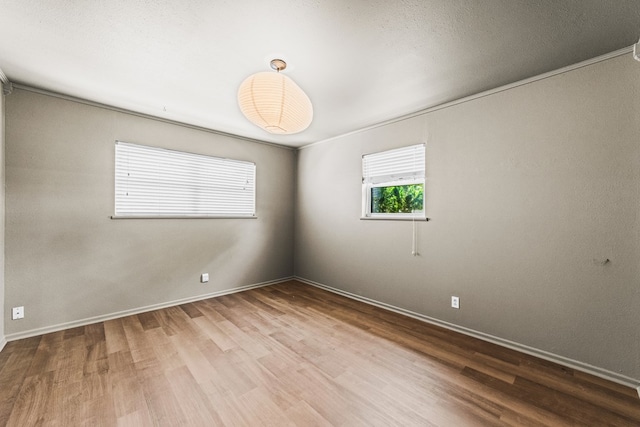 504 SW 19th St, Seminole, TX 79360 - spare room with wood finished floors and baseboards