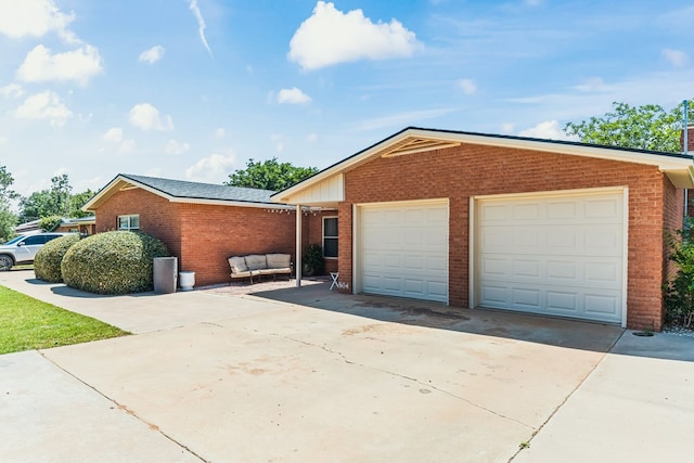 504 SW 19th St, Seminole, TX 79360 - view of front facade featuring brick siding and an outbuilding