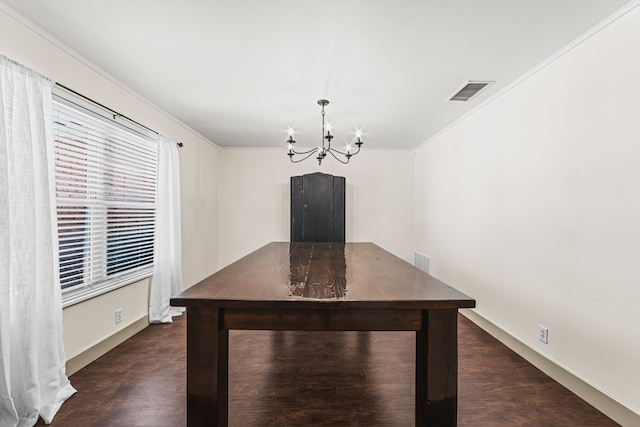504 SW 19th St, Seminole, TX 79360 - unfurnished dining area with a chandelier, ornamental molding, and dark wood-style floors