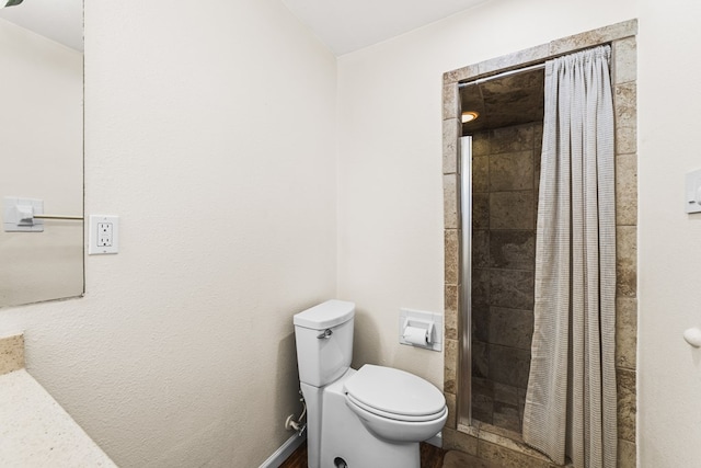 504 SW 19th St, Seminole, TX 79360 - bathroom with toilet and tiled shower