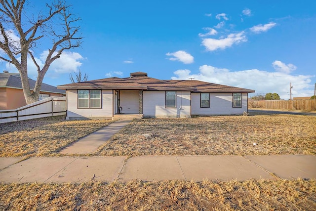 view of front of home with a front yard