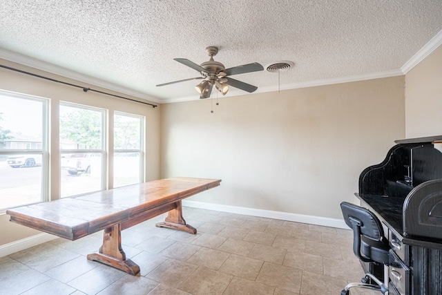 1829 Petroleum Dr, Odessa, TX 79762 - dining area featuring ceiling fan, baseboards, crown molding, and a textured ceiling