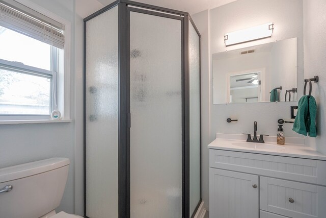 1829 Petroleum Dr, Odessa, TX 79762 - bathroom with vanity, a shower stall, and toilet