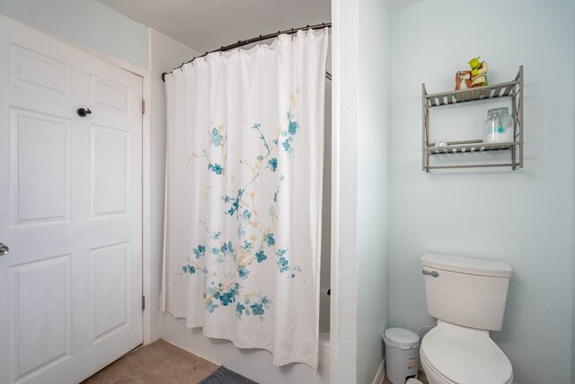 1829 Petroleum Dr, Odessa, TX 79762 - bathroom featuring toilet and shower / bath combo