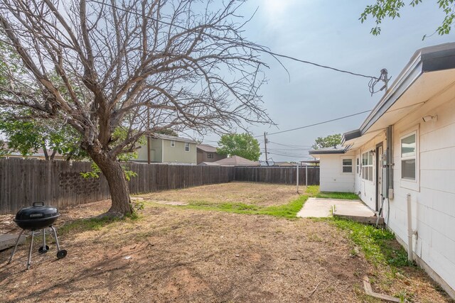 1829 Petroleum Dr, Odessa, TX 79762 - fenced backyard with a patio