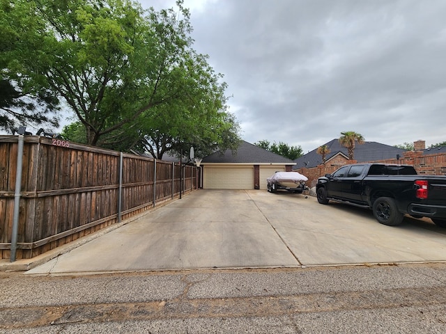 detached garage with fence