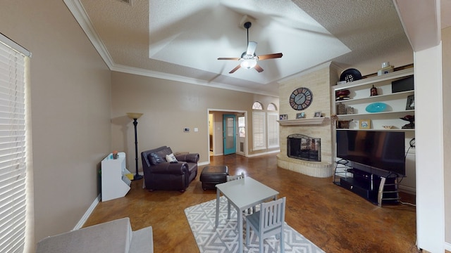 living area with crown molding, baseboards, ceiling fan, and a glass covered fireplace