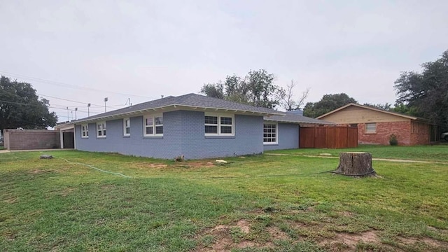 view of home's exterior featuring a yard