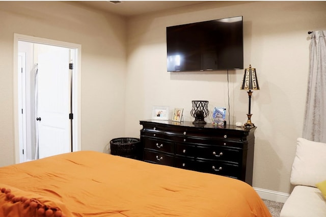 bedroom with baseboards