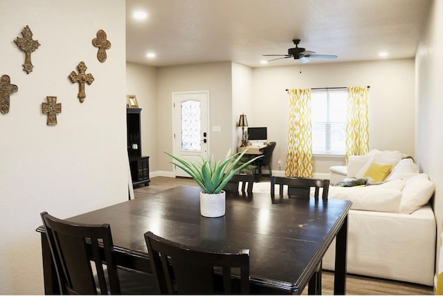 dining room with baseboards, a ceiling fan, and recessed lighting