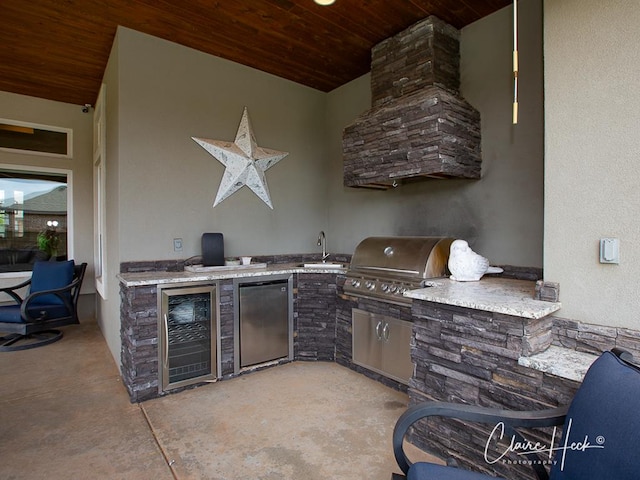 5300 Balfour Ct, Midland, TX 79707 - view of patio / terrace featuring beverage cooler and exterior kitchen