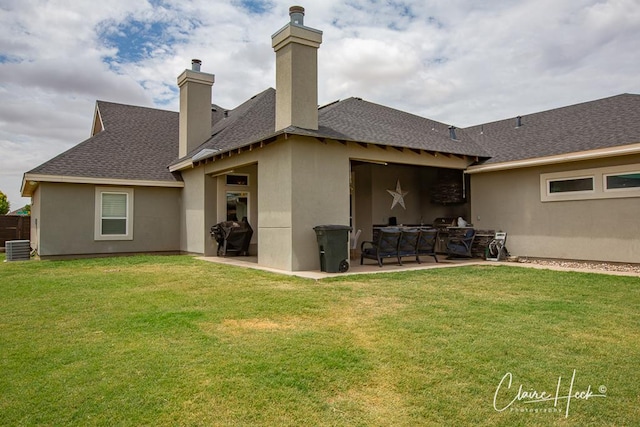 5300 Balfour Ct, Midland, TX 79707 - back of house with a patio area, stucco siding, a lawn, and a chimney