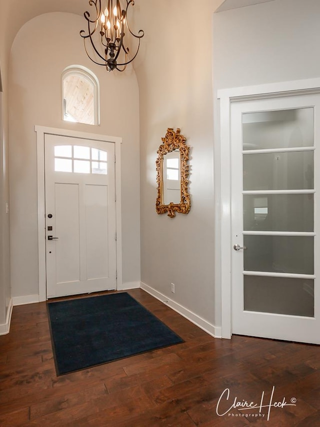 5300 Balfour Ct, Midland, TX 79707 - foyer entrance featuring a chandelier and dark wood-type flooring
