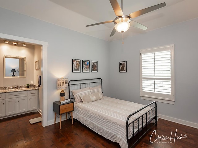 5300 Balfour Ct, Midland, TX 79707 - bedroom featuring dark wood-type flooring and ensuite bathroom
