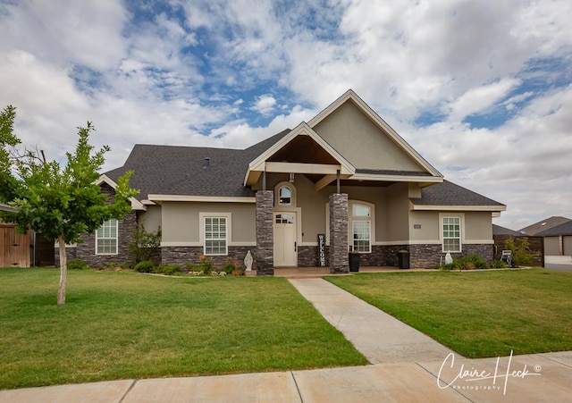 5300 Balfour Ct, Midland, TX 79707 - craftsman house with stucco siding, stone siding, and a front lawn