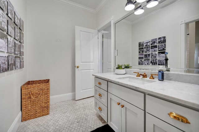 bathroom featuring vanity, baseboards, and crown molding