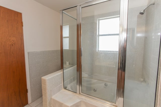 bathroom with separate shower and tub